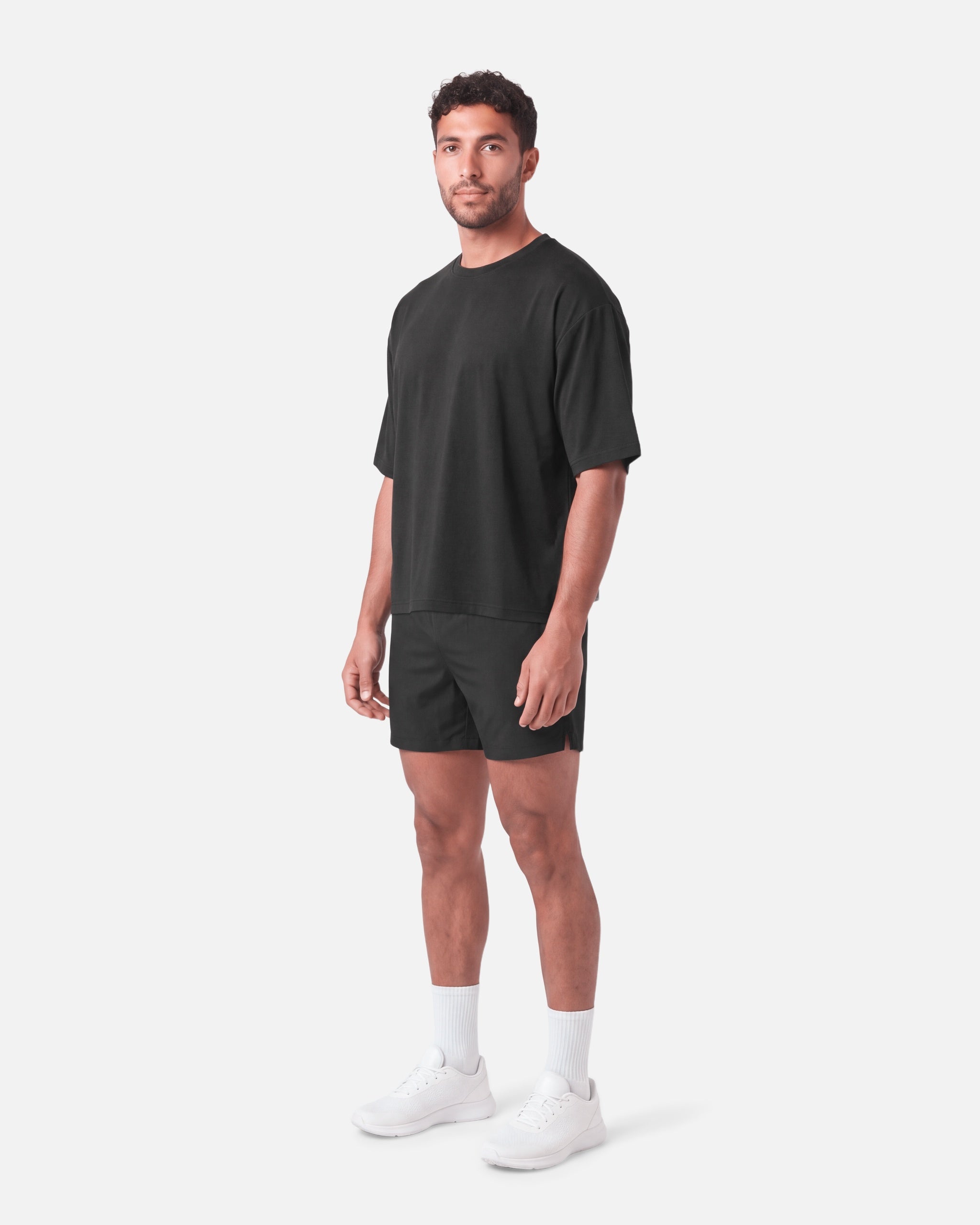 Boxy Tee Black - three-quarter view - Blanklines