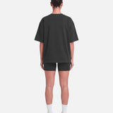 Boxy Tee Black - back view, female model - Blanklines
