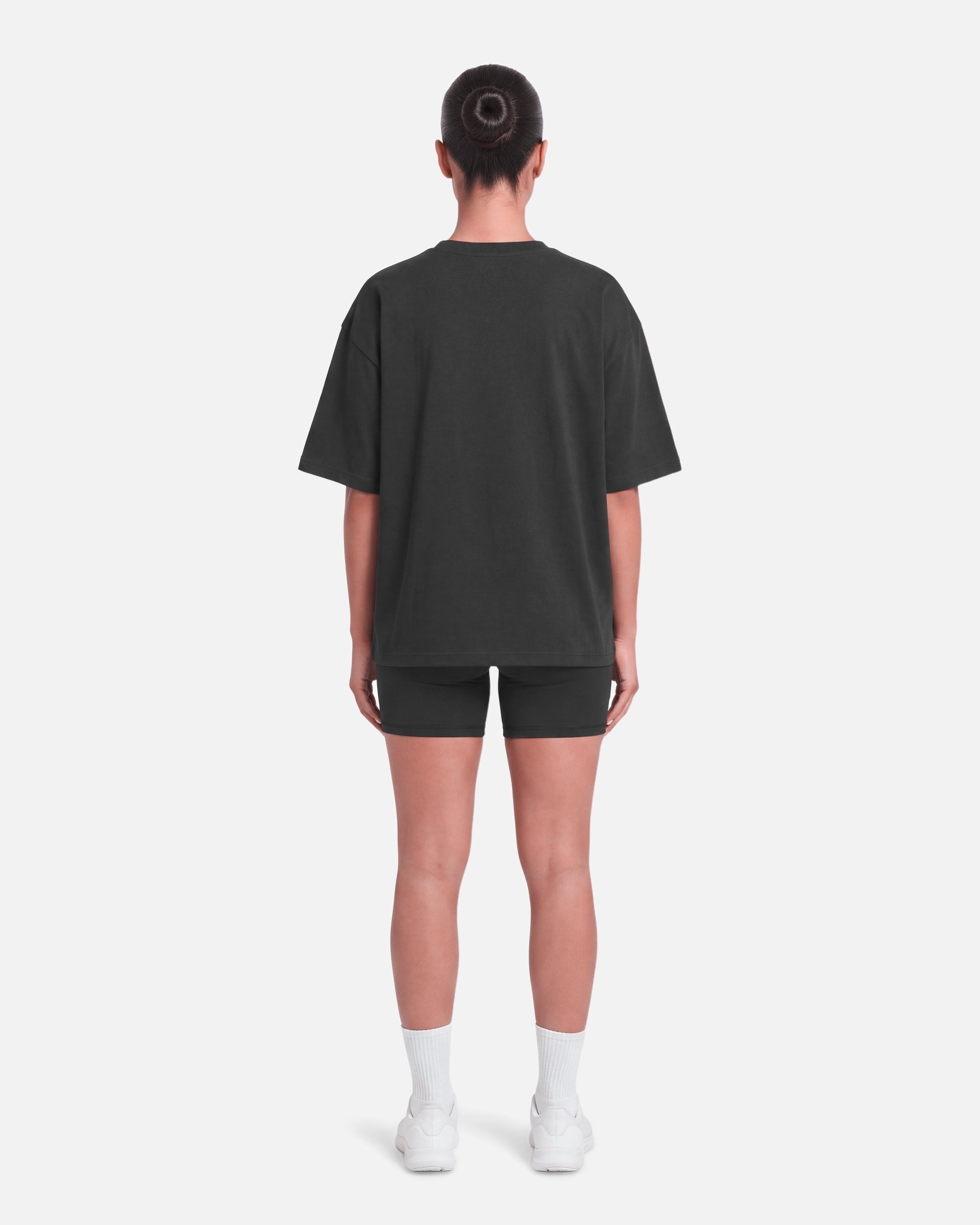Boxy Tee Black - back view, female model - Blanklines