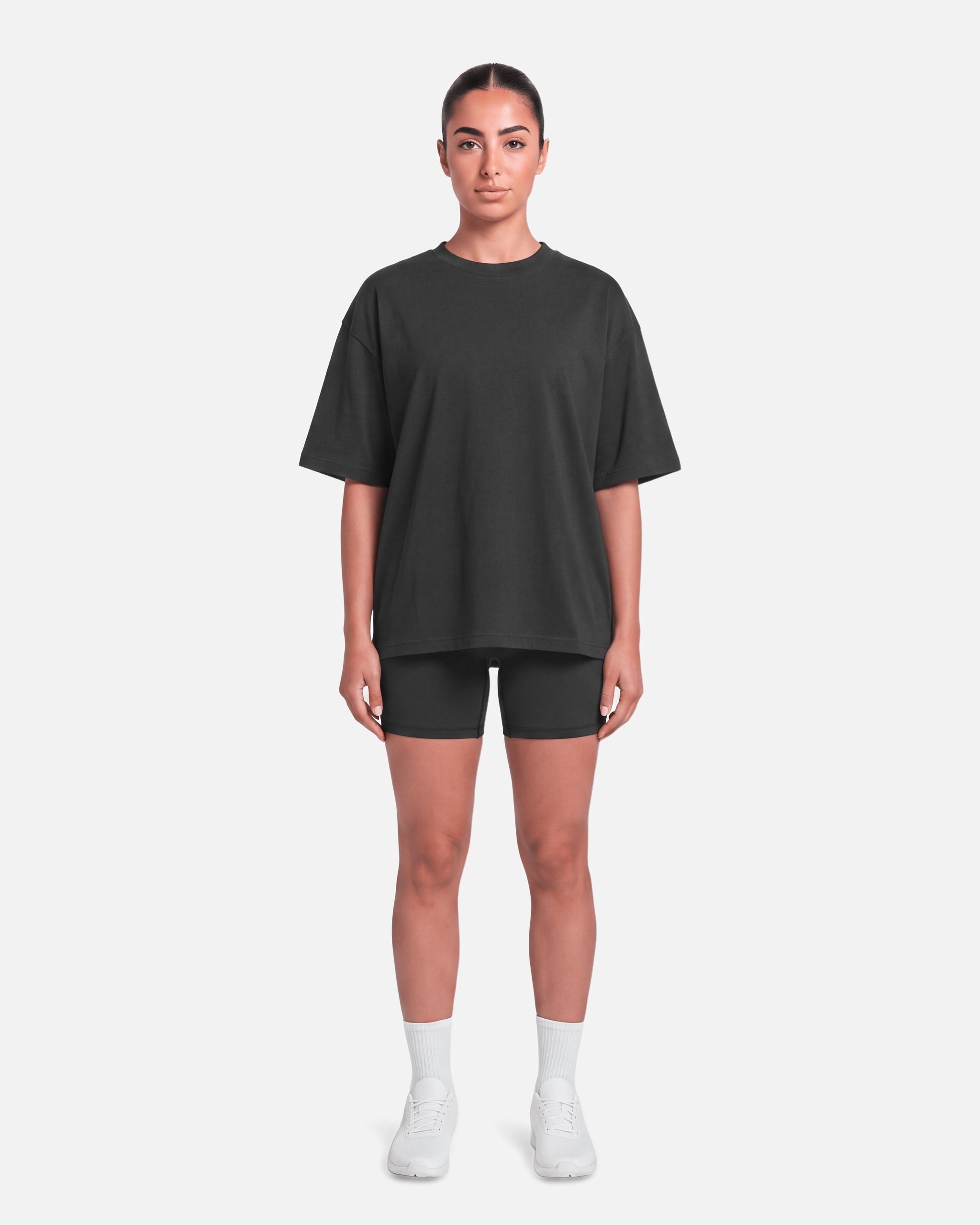 Boxy Tee Black - full length front view, female model - Blanklines